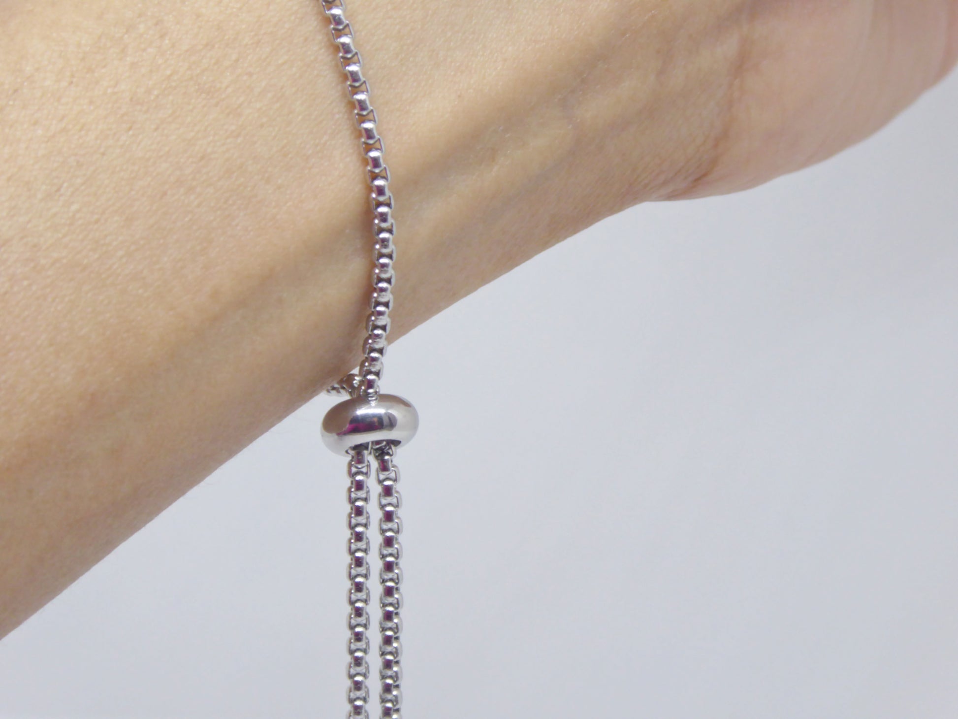 Chaine coulissante réglable acier inox